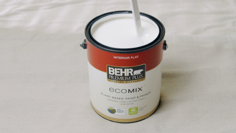 Can of white Behr premium plush ecomix plant-based paint