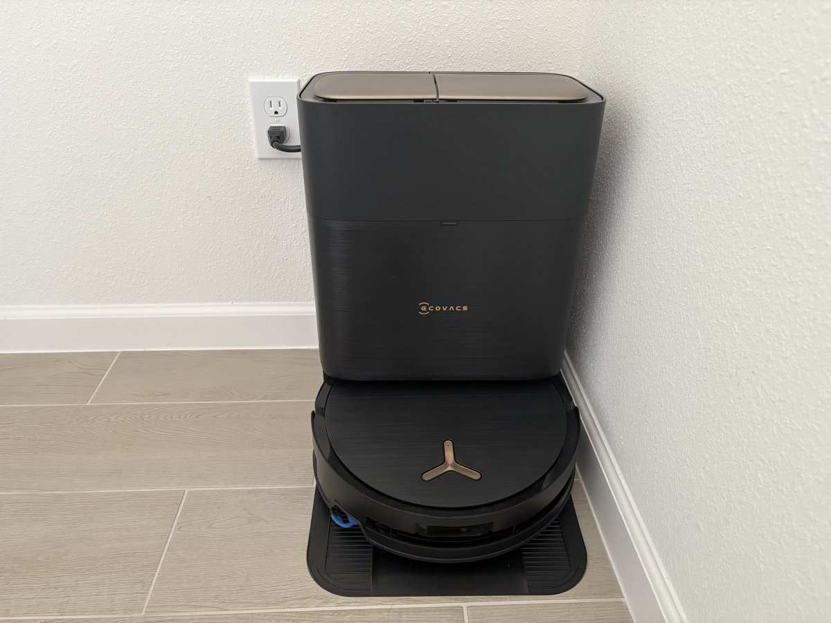 Evovacs X9 standing in a corner of a room