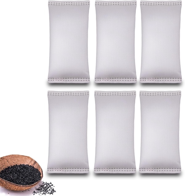 6 Hanyan coconut shell air purifier bags and a small bowl of charcoal.