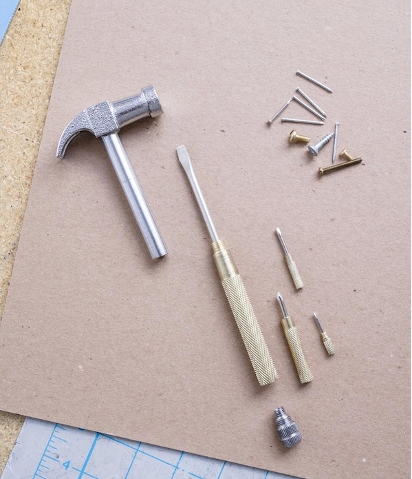 Kikkerland handy hammer multitool on a work surface.