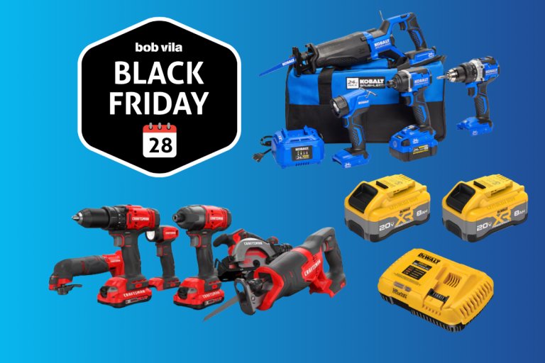 Multiple power tools and batteries on a blue background