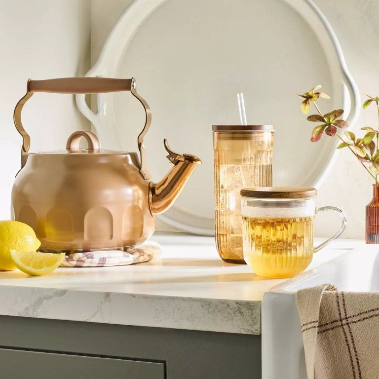 A tan vintage-inspired tea kettle from Magnolia Hearth & Home at Target.