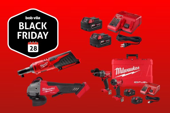 Multiple Milwaukee tools and batteries on a red background