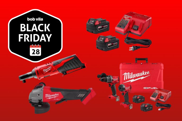 Multiple Milwaukee tools and batteries on a red background