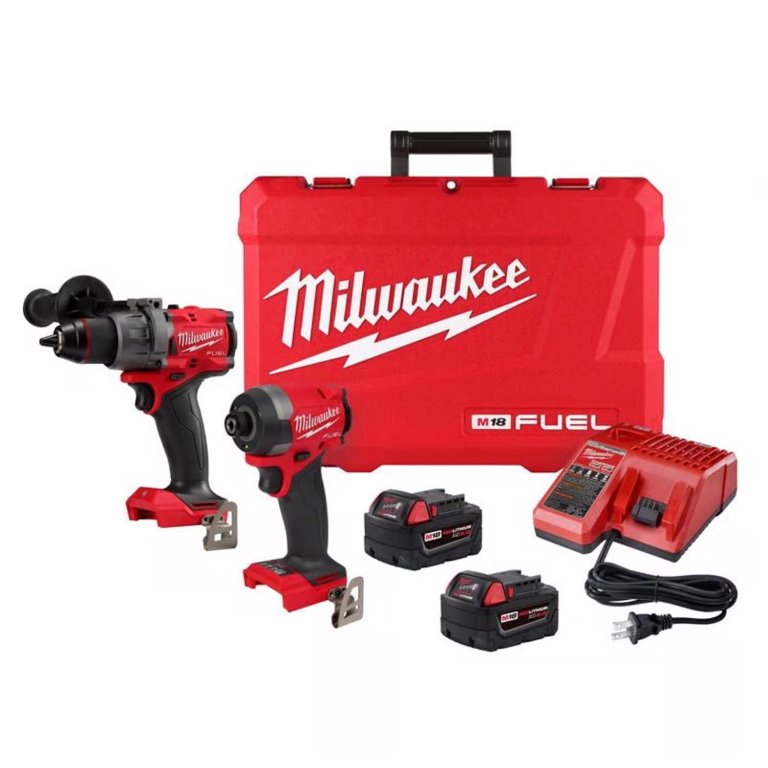 Milwaukee drill, impact driver, 2 batteries, one charger and a hard carry case on a white background