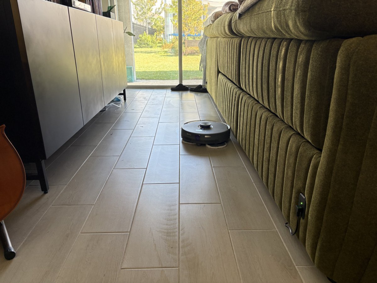 robot vacuum cleaning the floor in a living room
