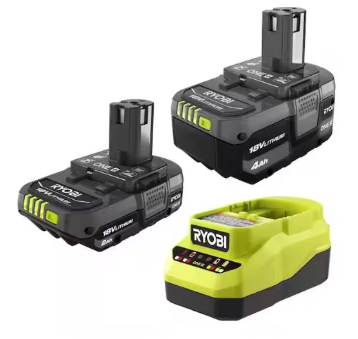 Two ryobi batteries and a charger on a white background