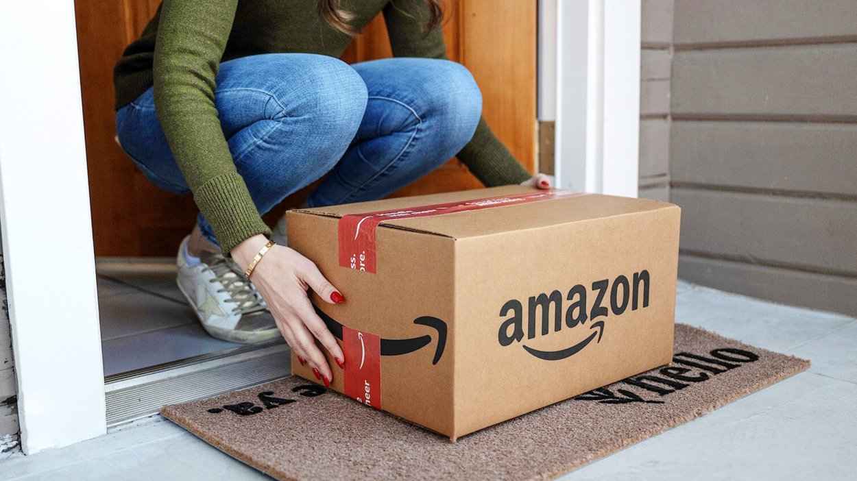 Person picking up Amazon delivery