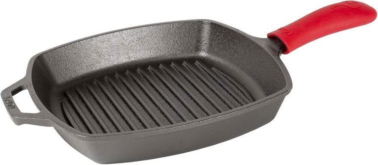 Lodge grill pan with red silicone handle protector.