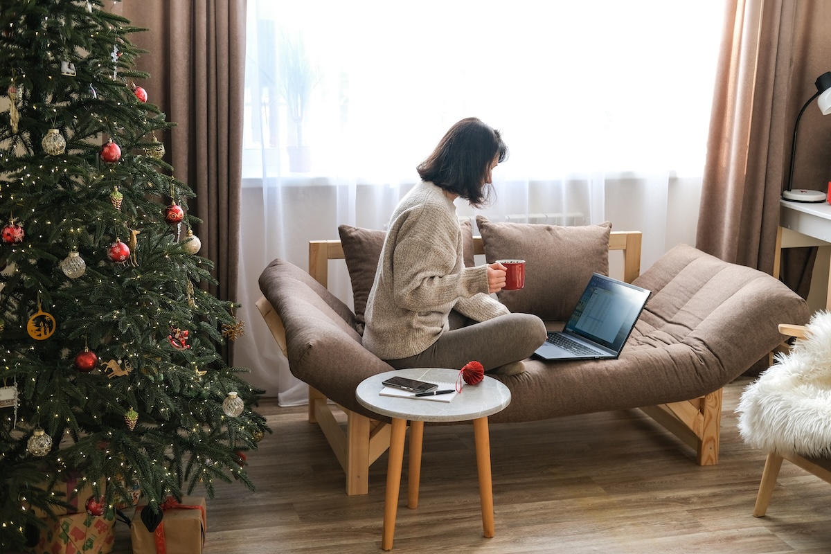 A homeowner ordering cozy things for her home online.