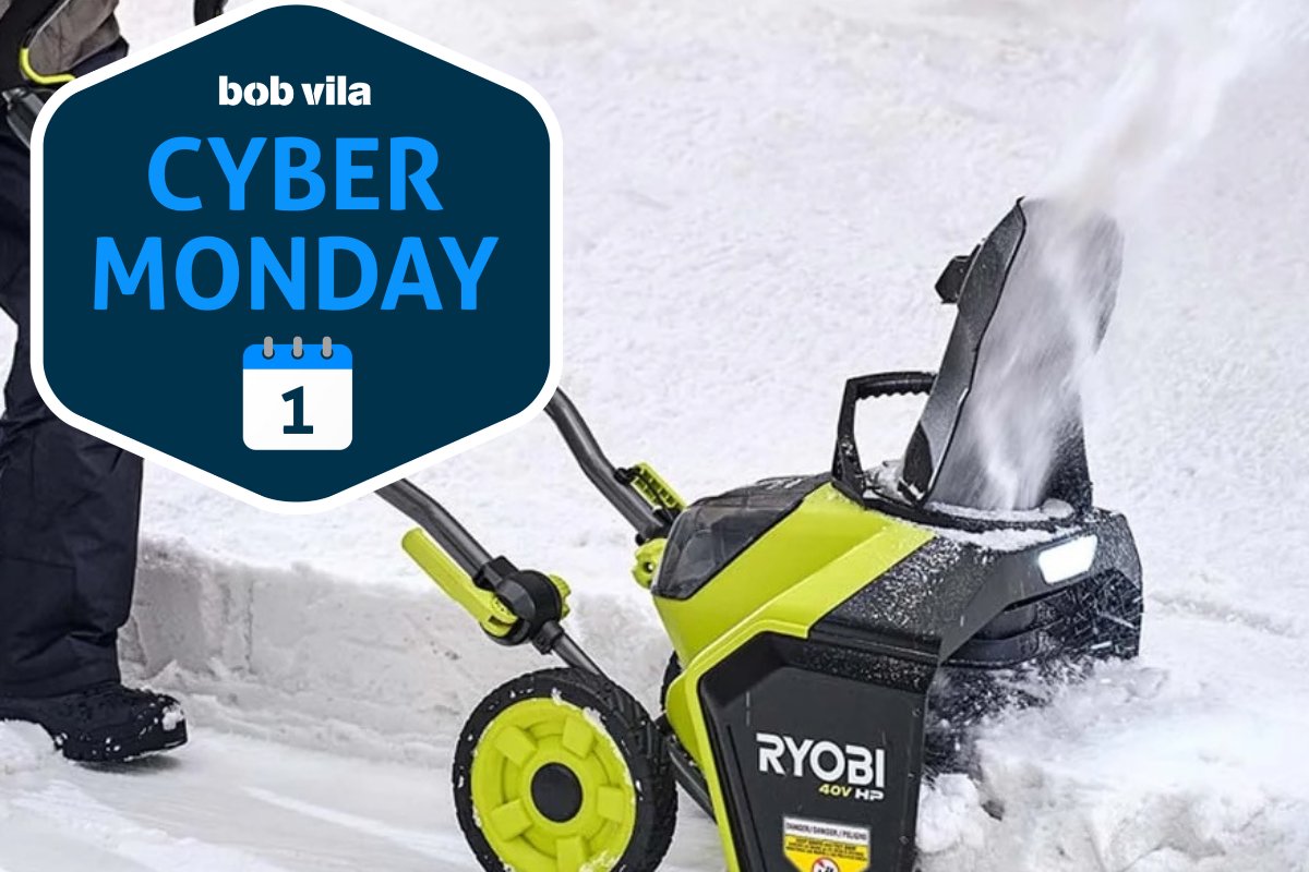 Ryobi Snowblower in use in snowy driveway.