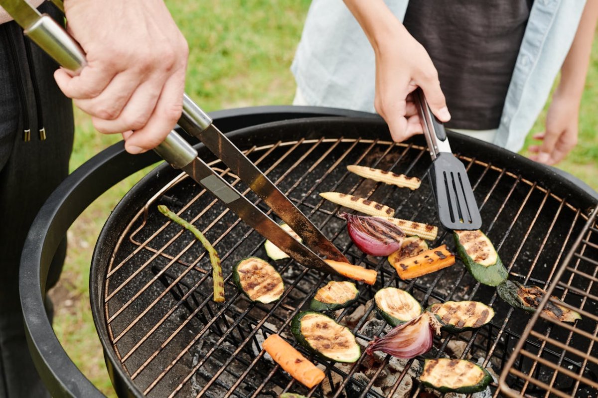 People Grilling Fresh Vegetable with grilling accessories