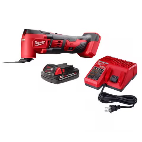 Milwaukee M18 Cordless Oscillating Multi-Tool Kit with battery and charger on a white background