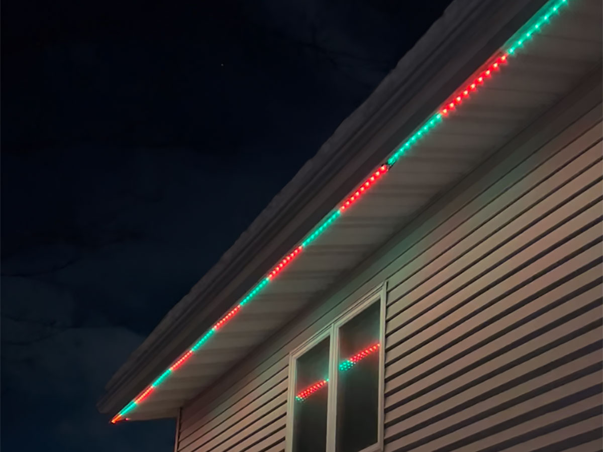 Bob Vila editor's house with Govee Outdoor Strip Lights installed along the roofline.