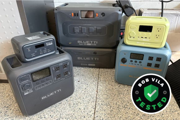 Several Bluetti power stations on a garage floor