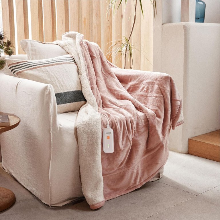 GOTCOZY Heated Blanket Electric Throw over an armchair
