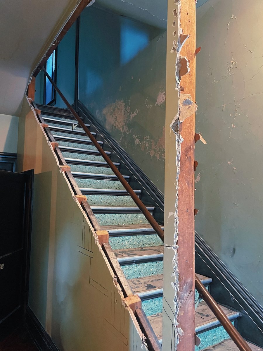 During demo of staircase wall.