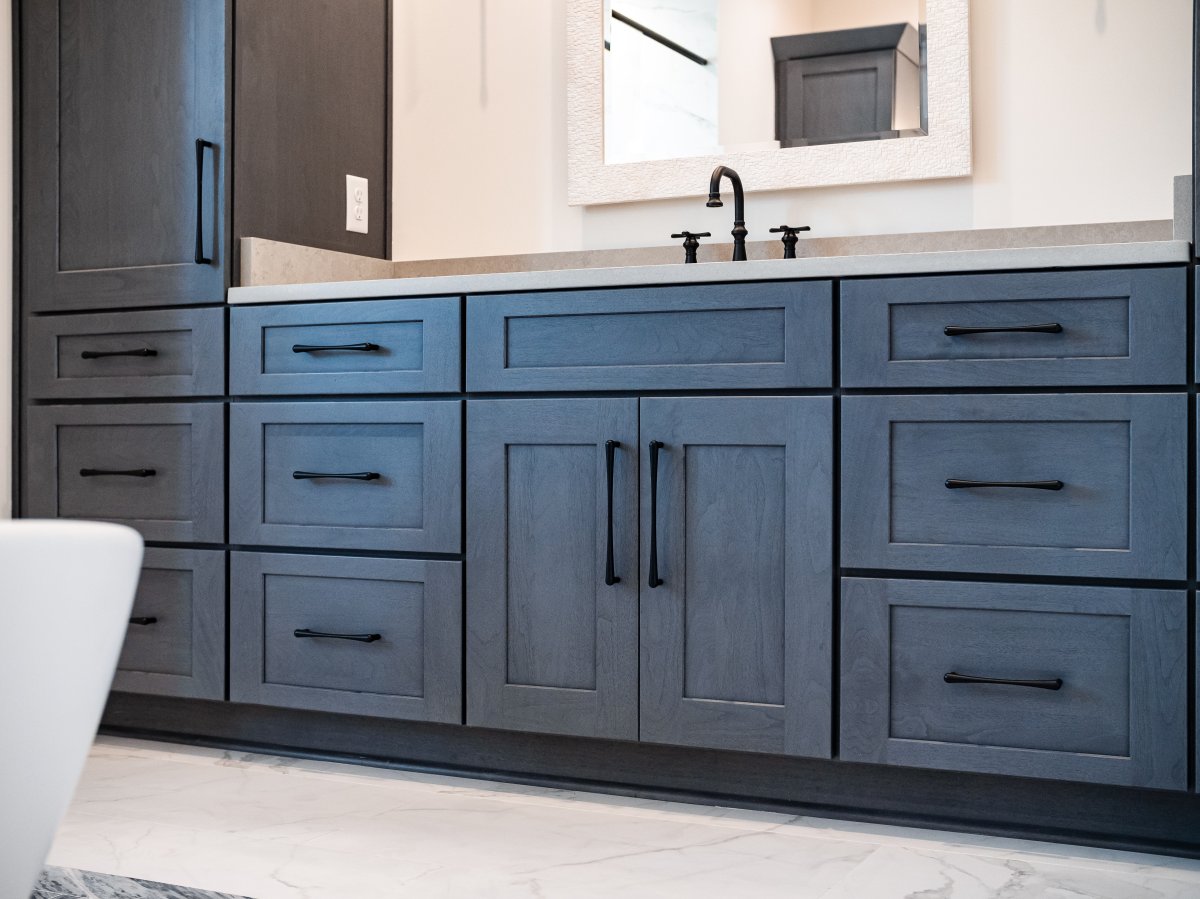 Dark wood built-in bathroom vanity.