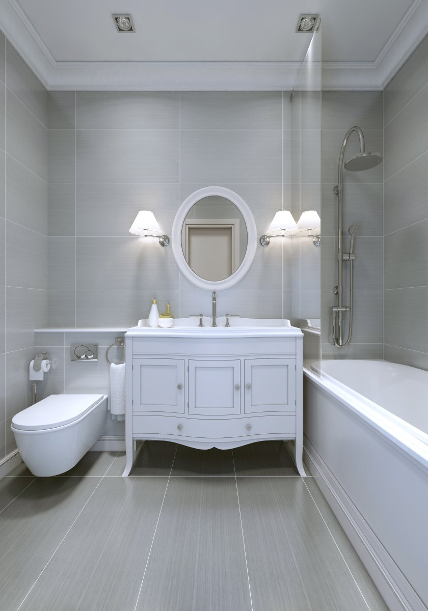 White furniture-style bathroom vanity in an all-white bathroom.