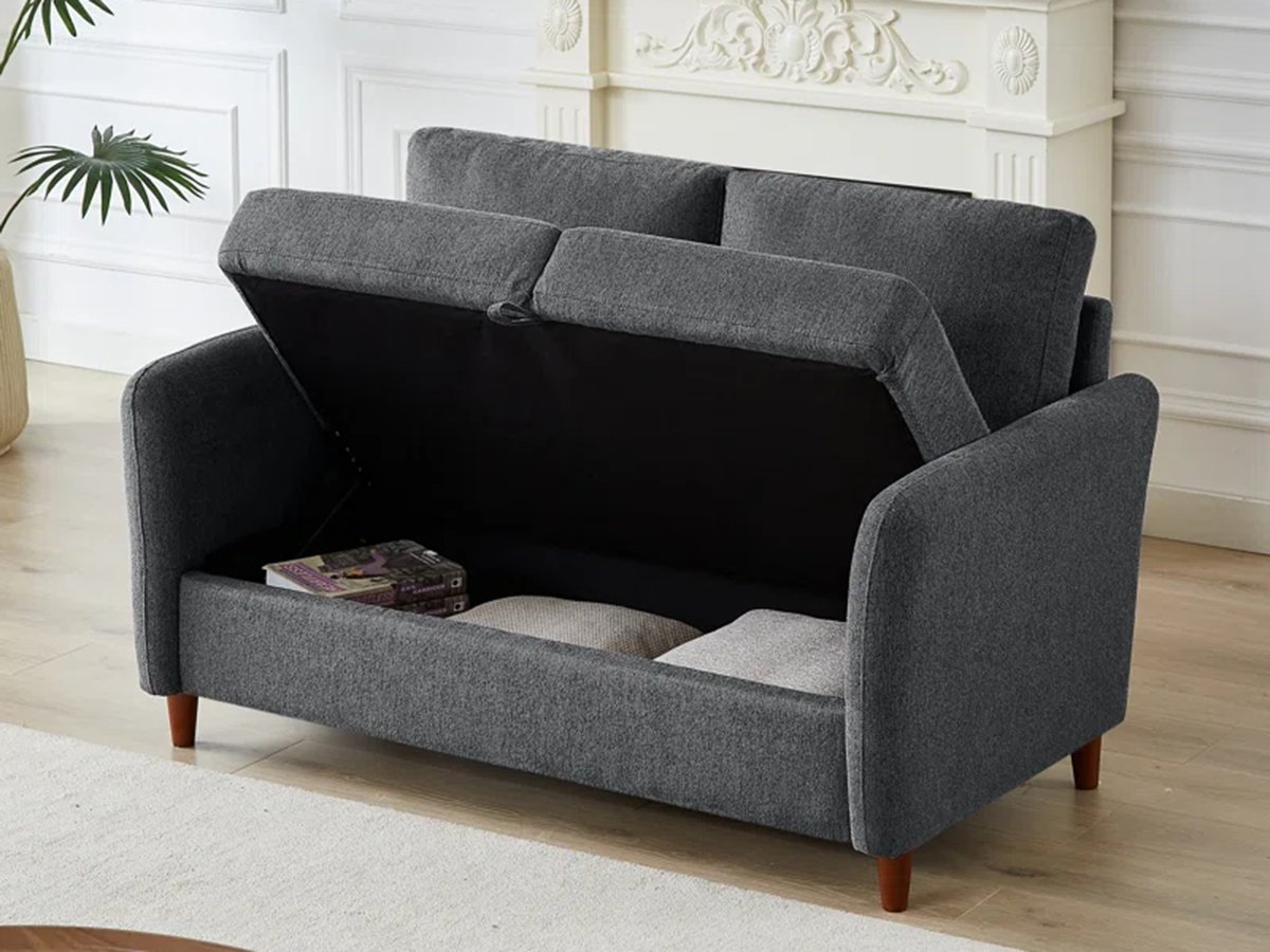 Sofa with storage space under cushions.