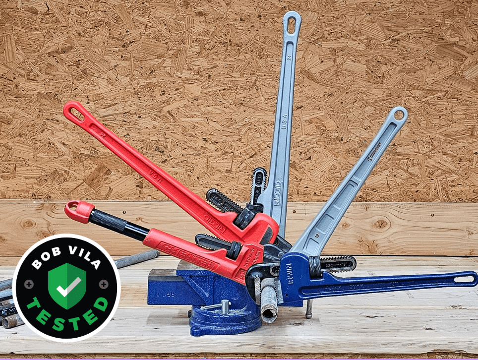 Five of the Best Pipe Wrenches on a wood work surface