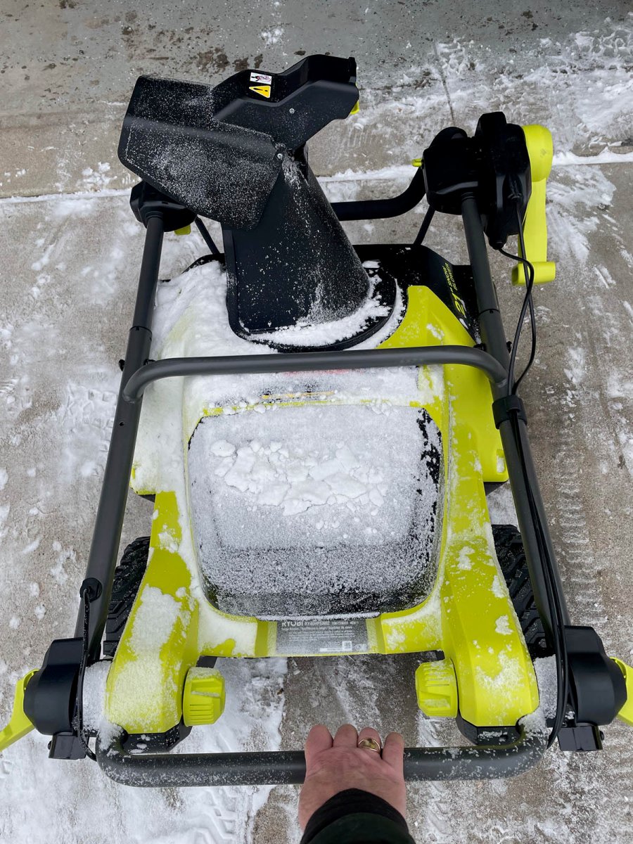 The Ryobi 40V 21” Snow Blower folded for storage