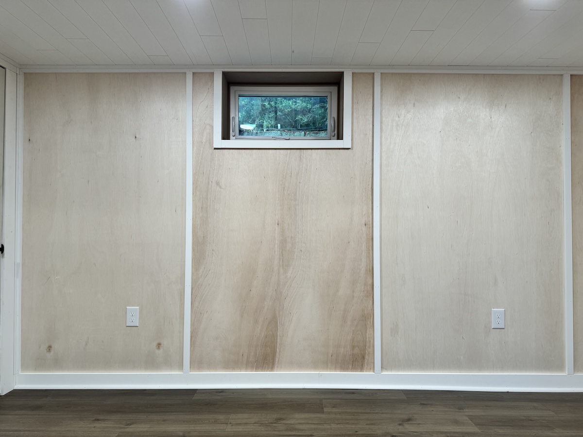 Trimmed basement window.