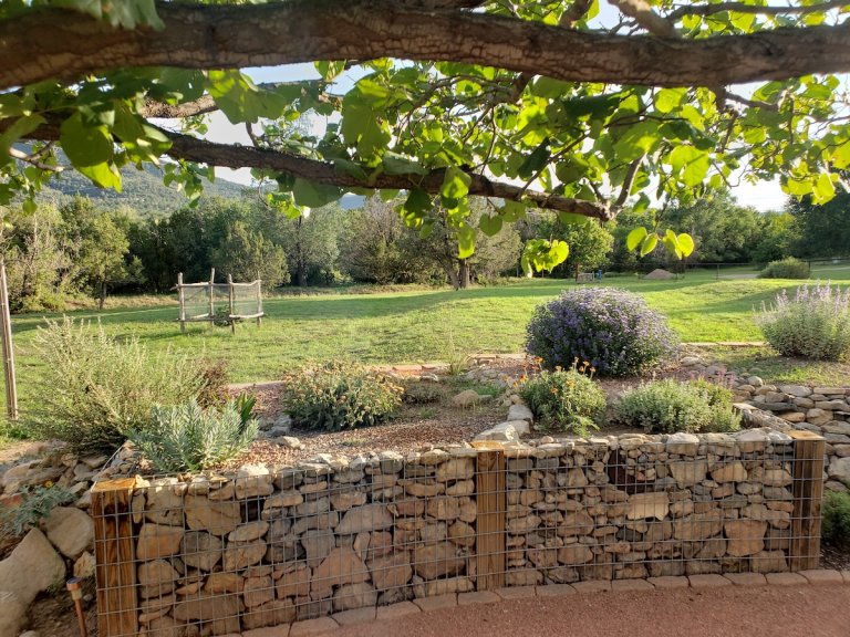 Gabion walls in a home landscape in the Southwest United States.