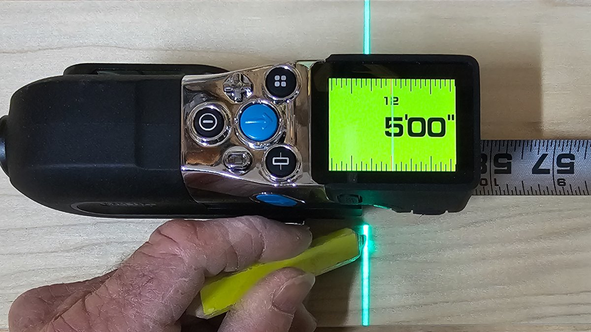 Using laser line from XTape 1 to mark measurement