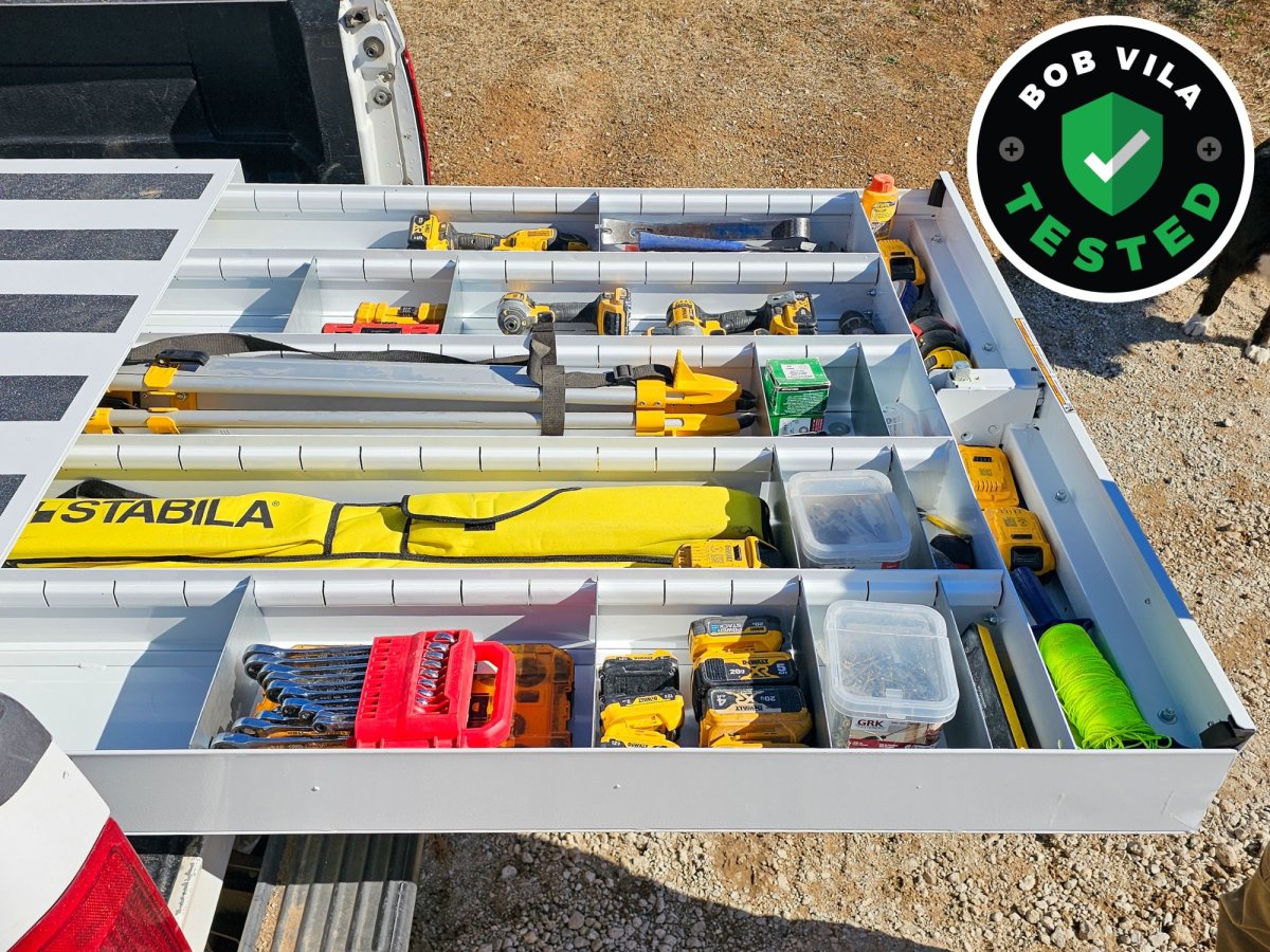 The Weather Guard Truck Bed Tool Box installed and open to show its full of tools