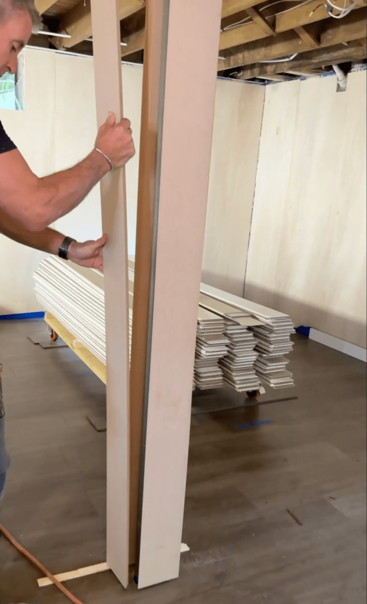 wrapping a basement column in trim.