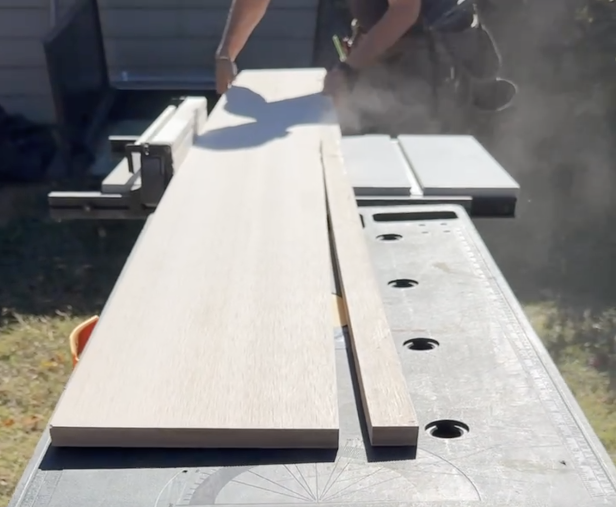 Cutting window box and trim for basement window on a table saw.