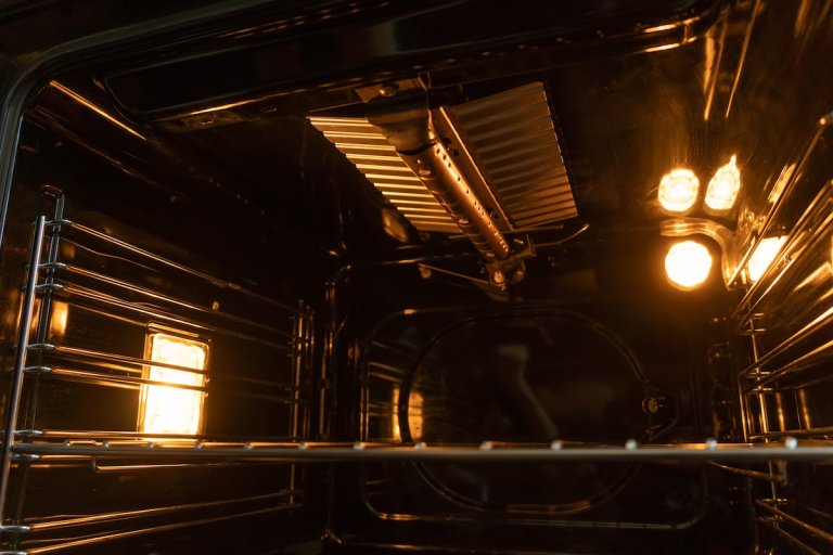 A heating element inside a gas oven.