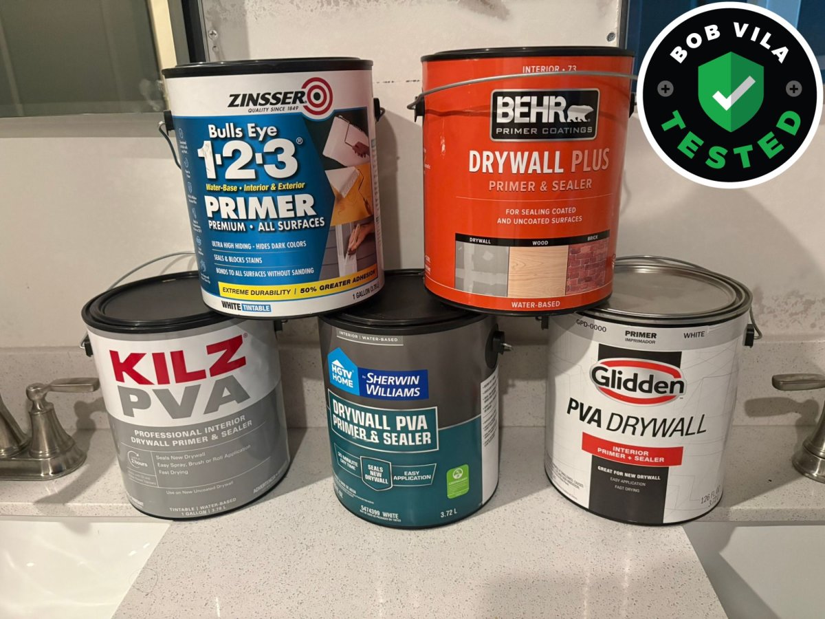 A group of the best drywall primers stacked atop one another before testing
