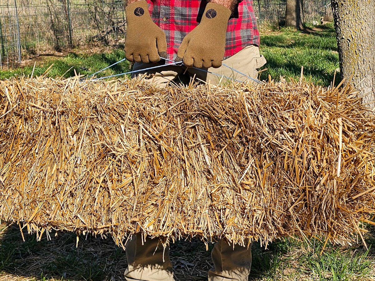 Cross Point gloves protect hands for carrying bale