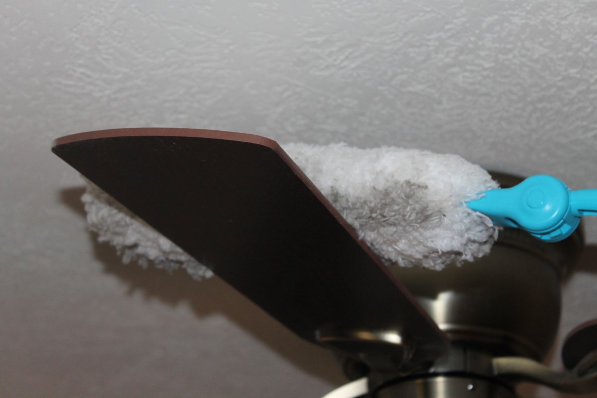 Ecloth Dust Mop with duster attachment cleaning a ceiling fan blade