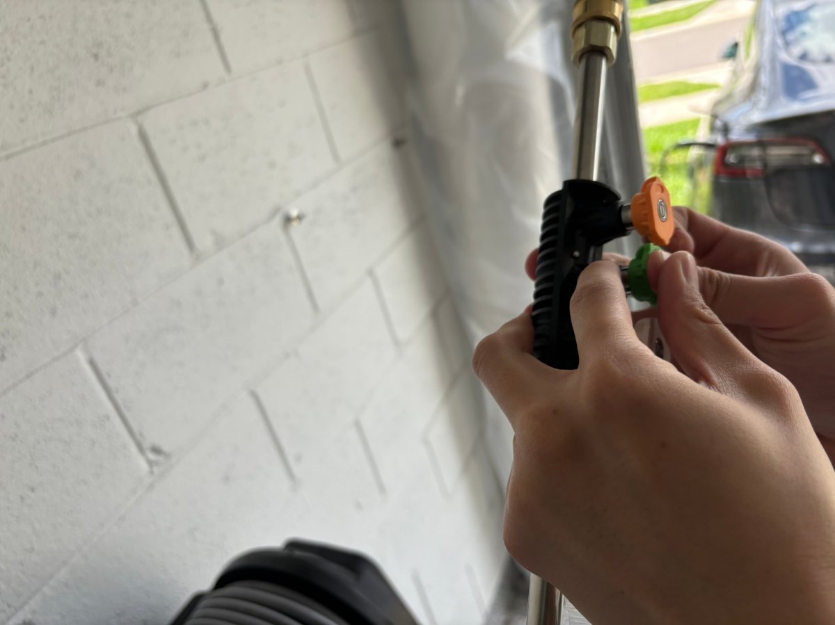 Installing the Giraffe Tools pressure washer nozzle during testing