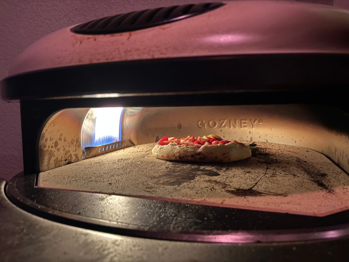 Using the Gozney Arc XL to cook a dessert pizza during testing