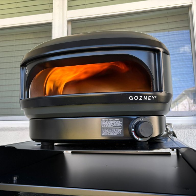 The Gozney Arc Lite Pizza Oven with a large interior flame during testing