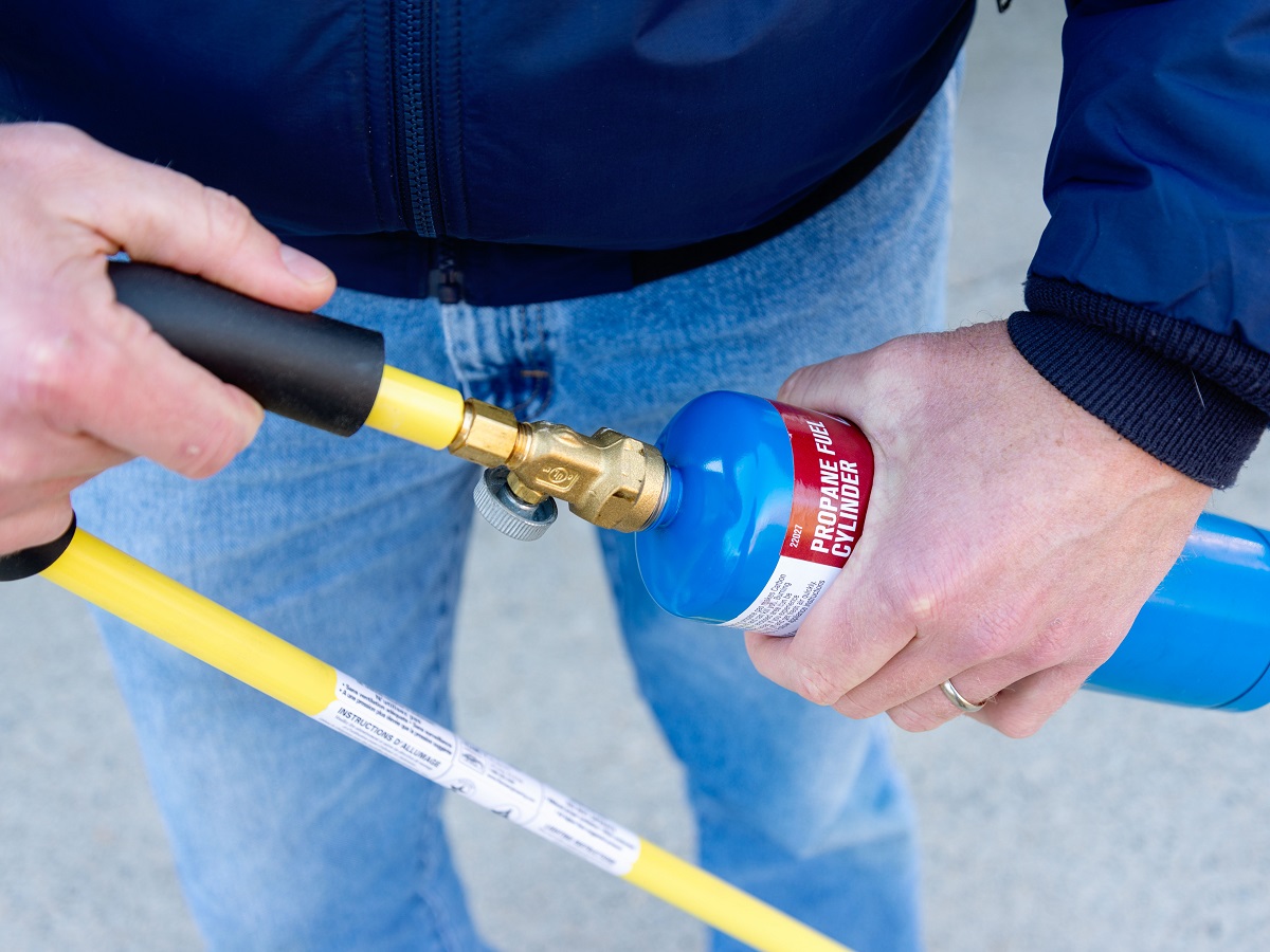 Connecting a weed torch.