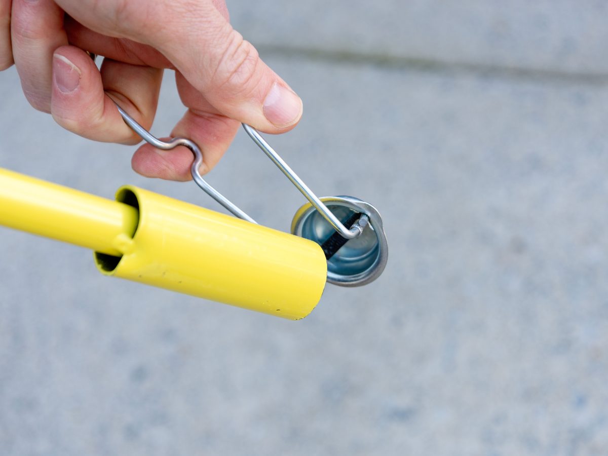 Lighting a weed torch.