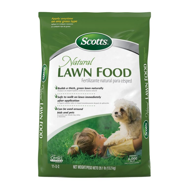 A bag of Scotts Natural Lawn Food on a white background