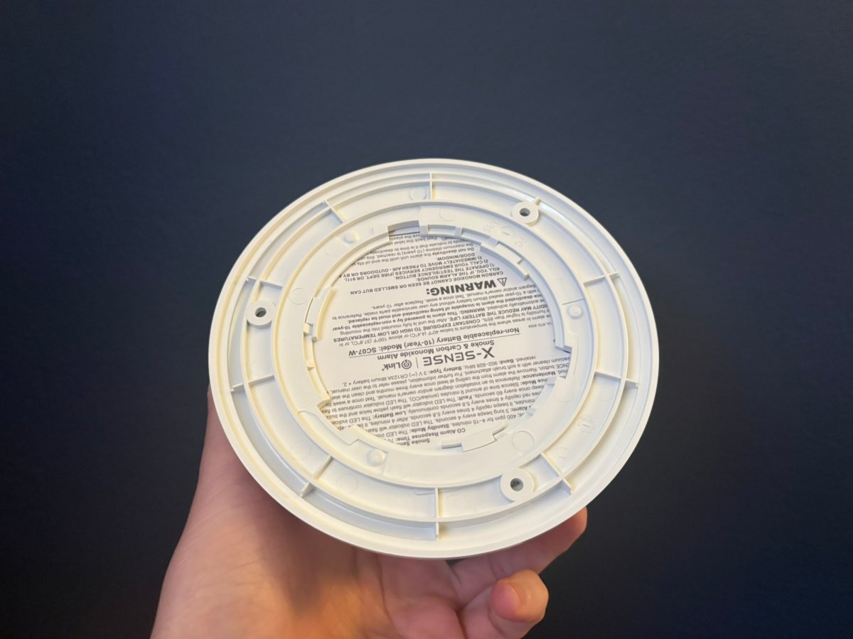 The sealed back of the X-Sense Smoke and CO alarm mount back