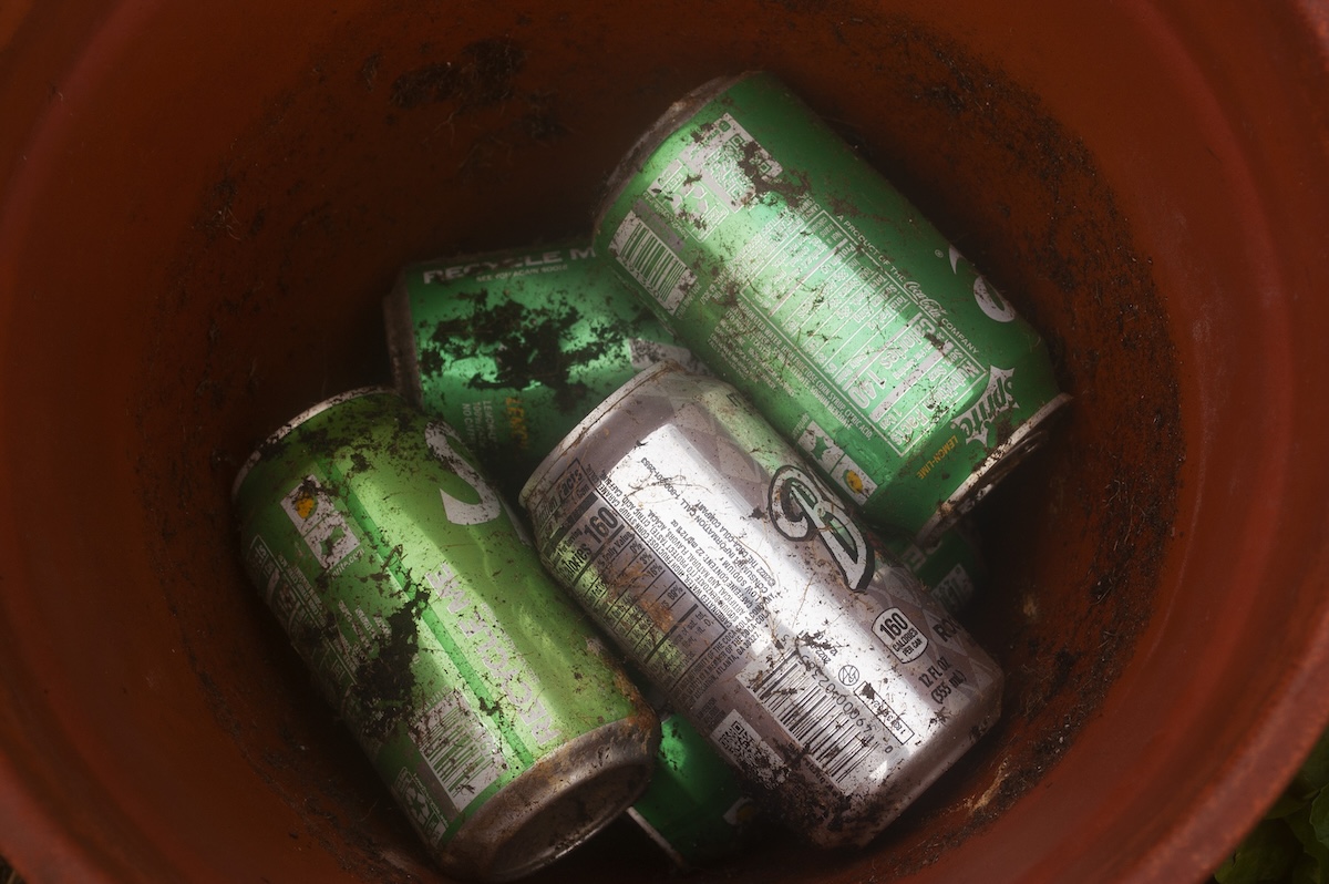 Aluminum cans recycled into filler for large outdoor planters.