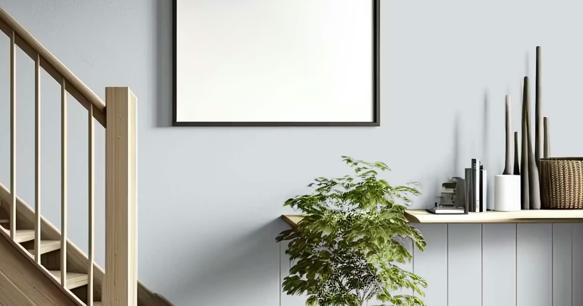 Scene of staircase with light grey paint on a wall and modern decor