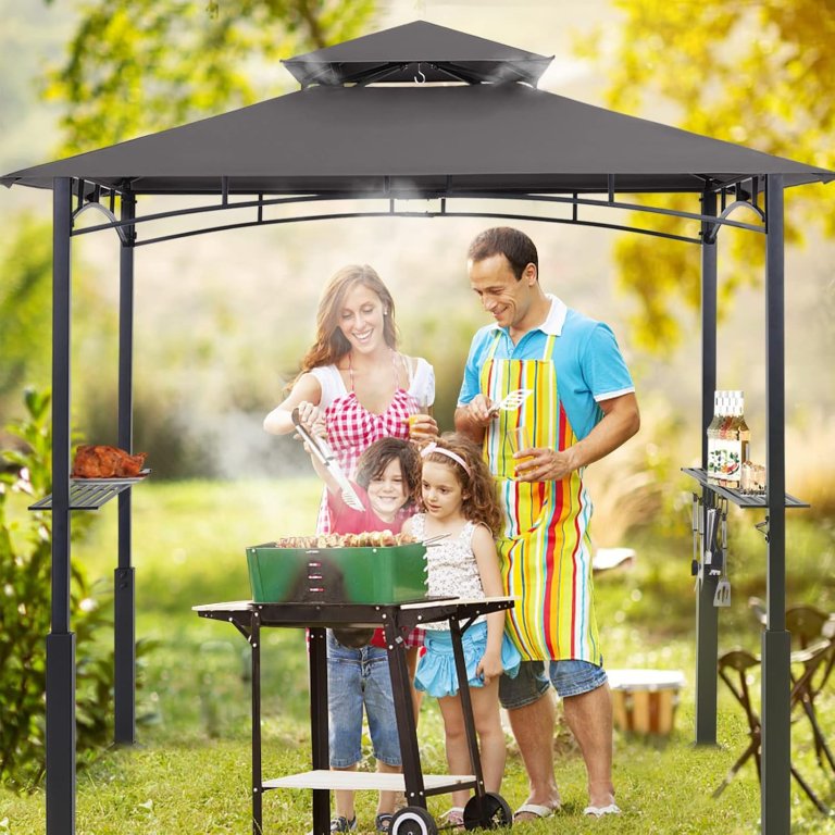 A family grilling together under the ABCCanopy BBQ Grill Gazebo