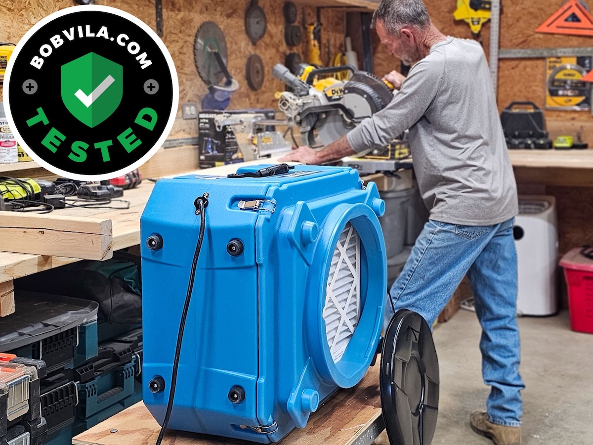 AlorAir Air Scrubber in use in a dusty workshop
