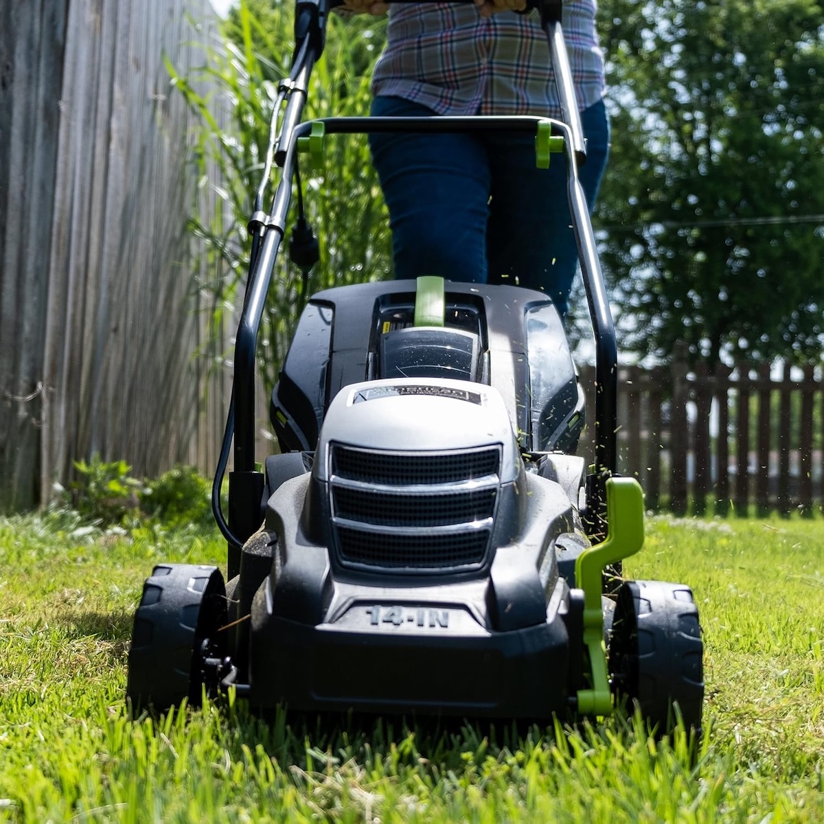 The American Lawn Mower Company 50514 14" Corded Mower in use mowing a lawn