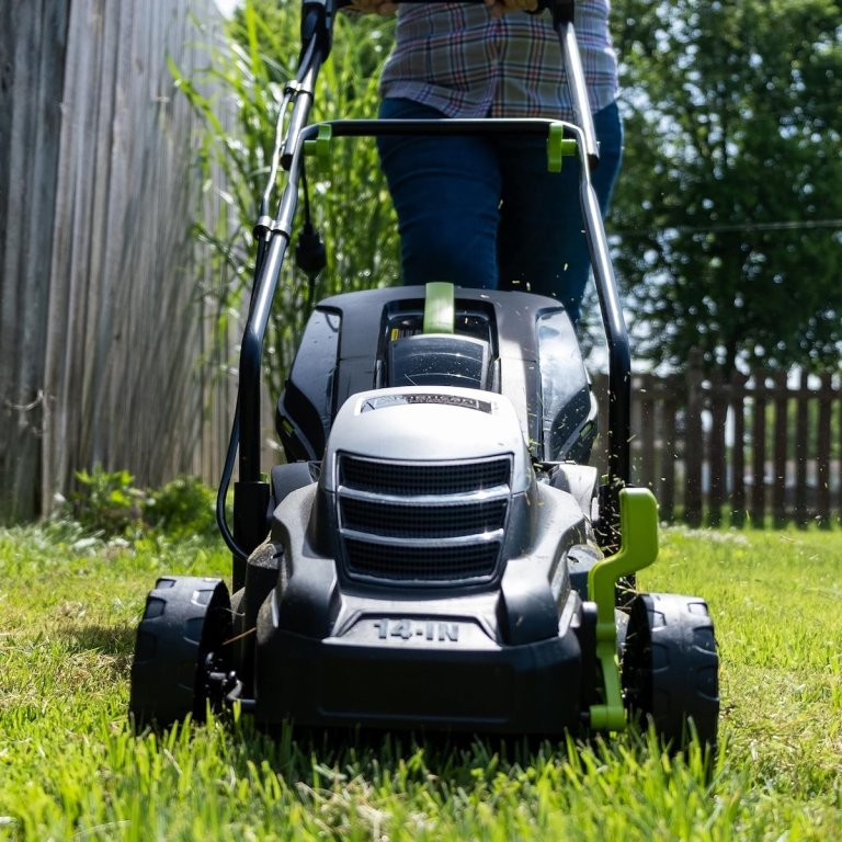The American Lawn Mower Company 50514 14" Corded Mower in use mowing a lawn