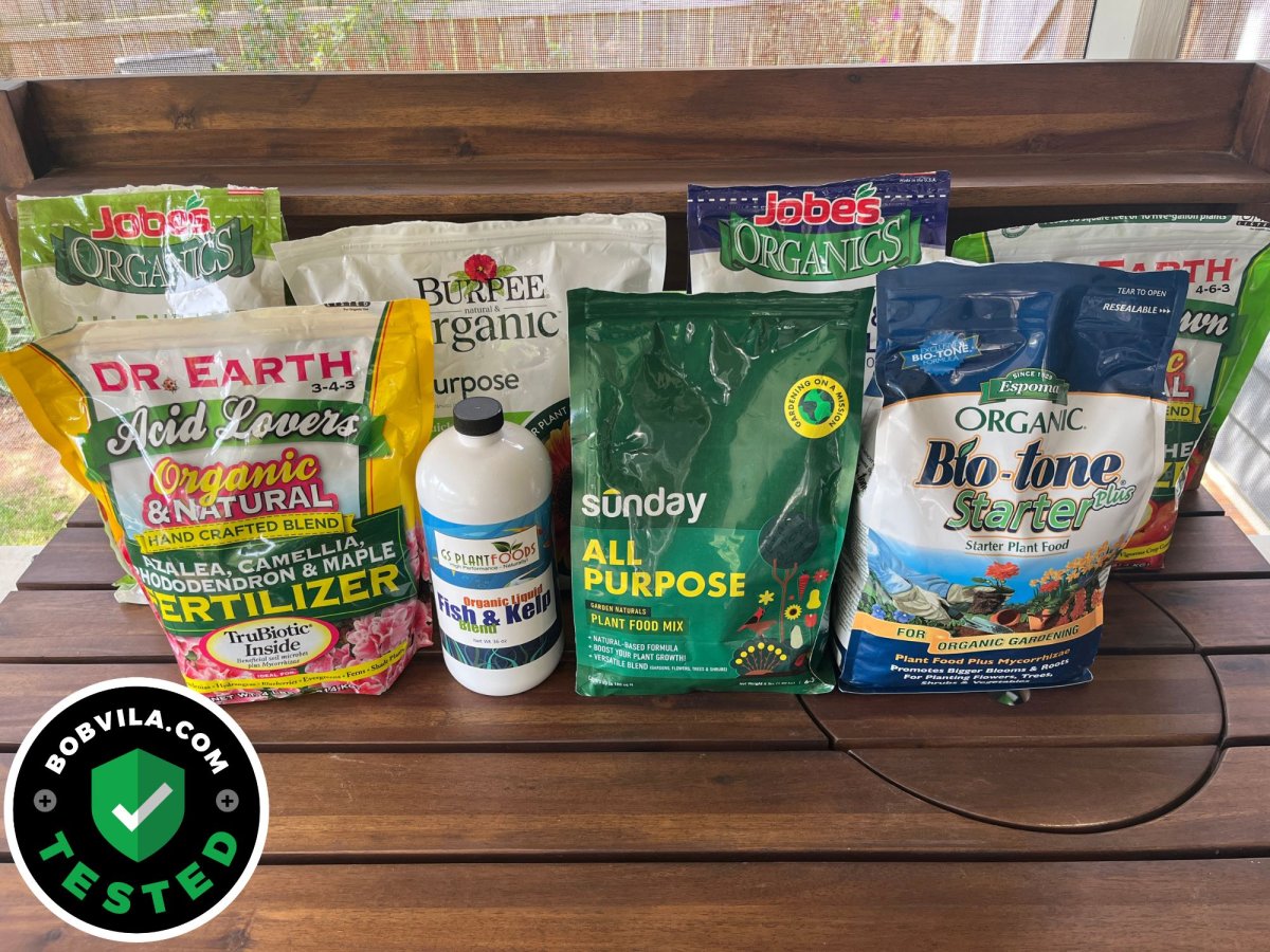A group of the best garden fertilizers on an outdoor table before testing